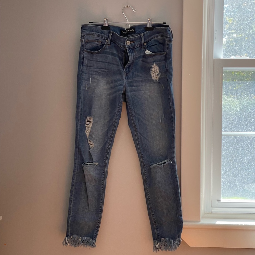 Express distressed jean with raw gem size 10